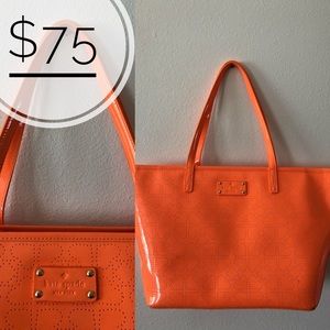 Orange vinyl Kate Spade bag
